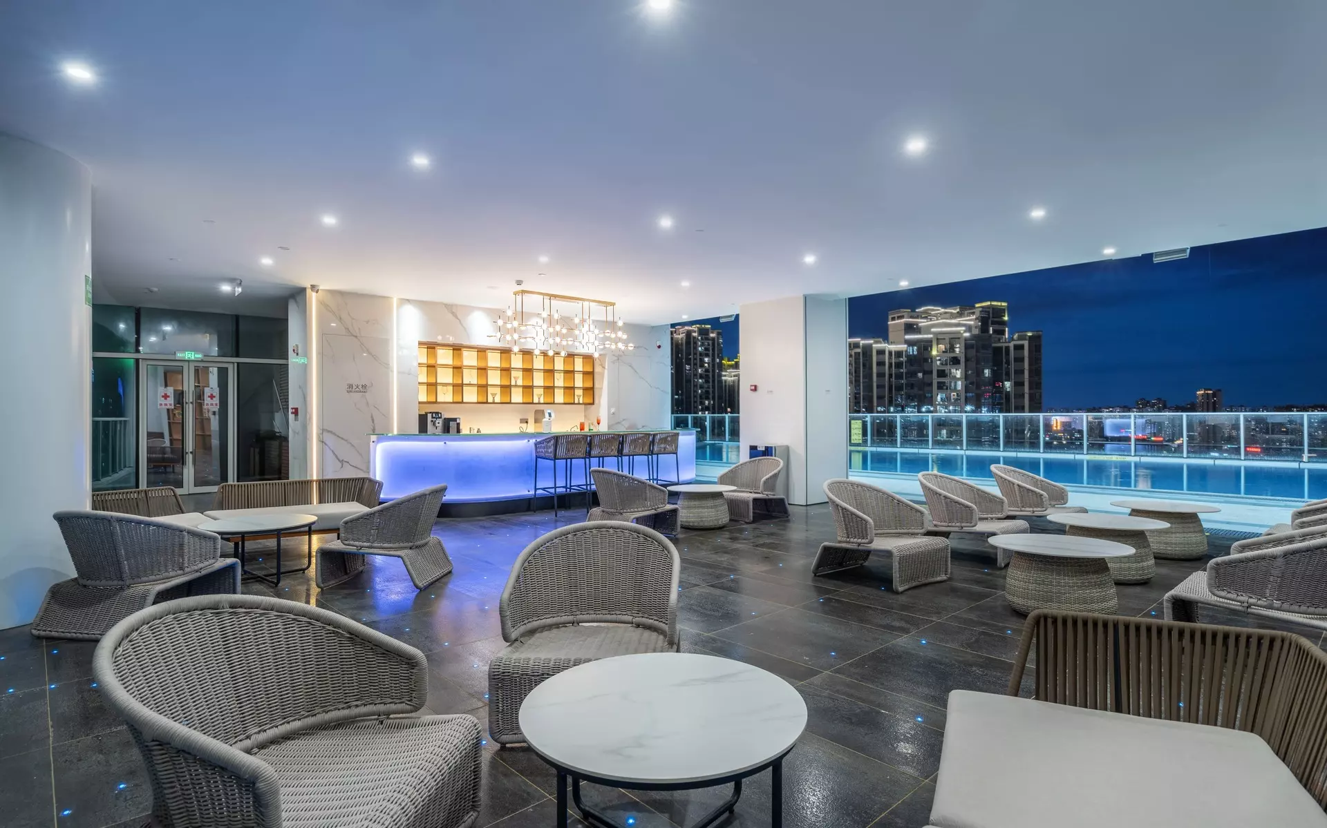 Sophisticated hospitality bar seating area featuring custom wood wall panels