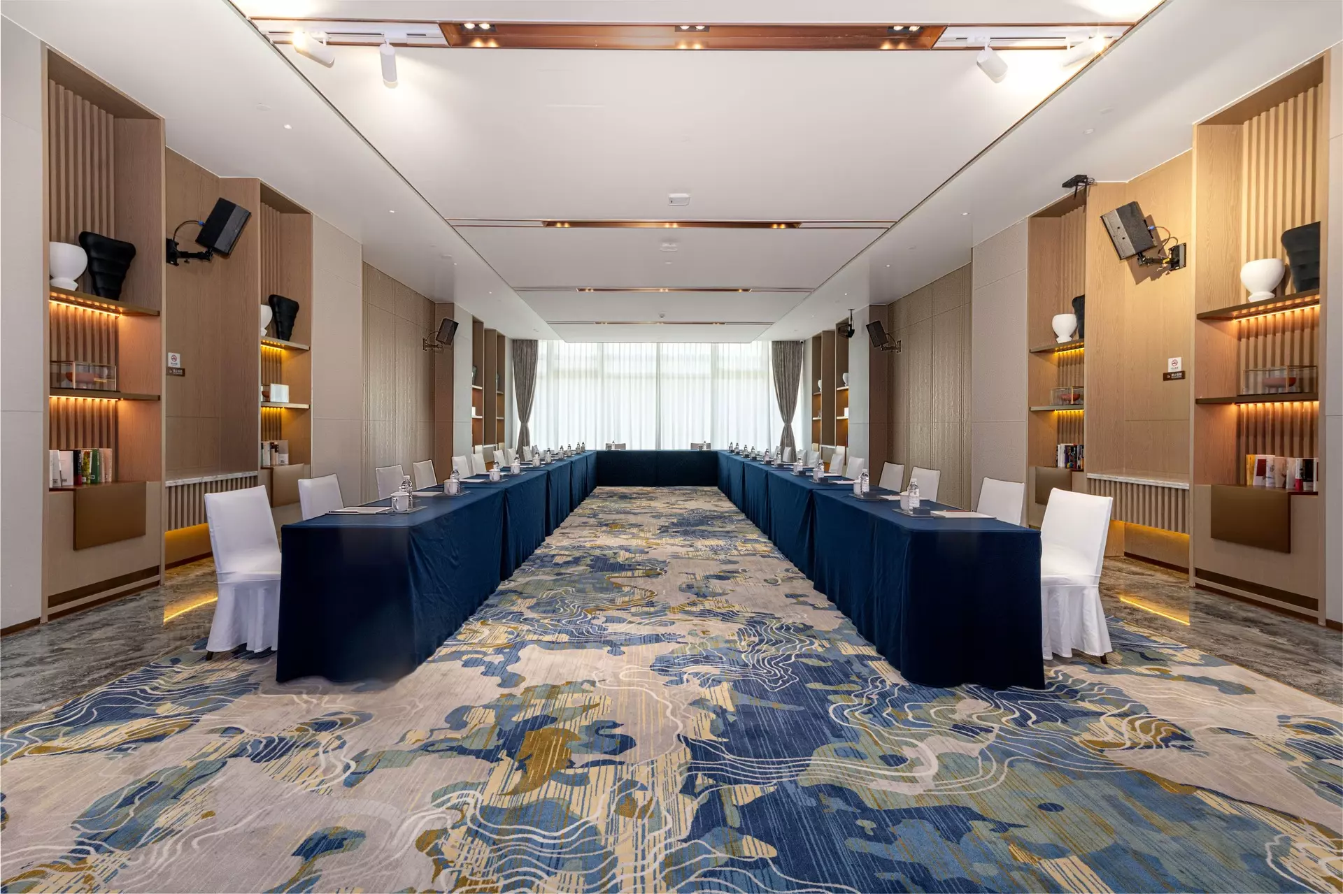 Custom conference table and high-end wall paneling by Hopeful Furniture