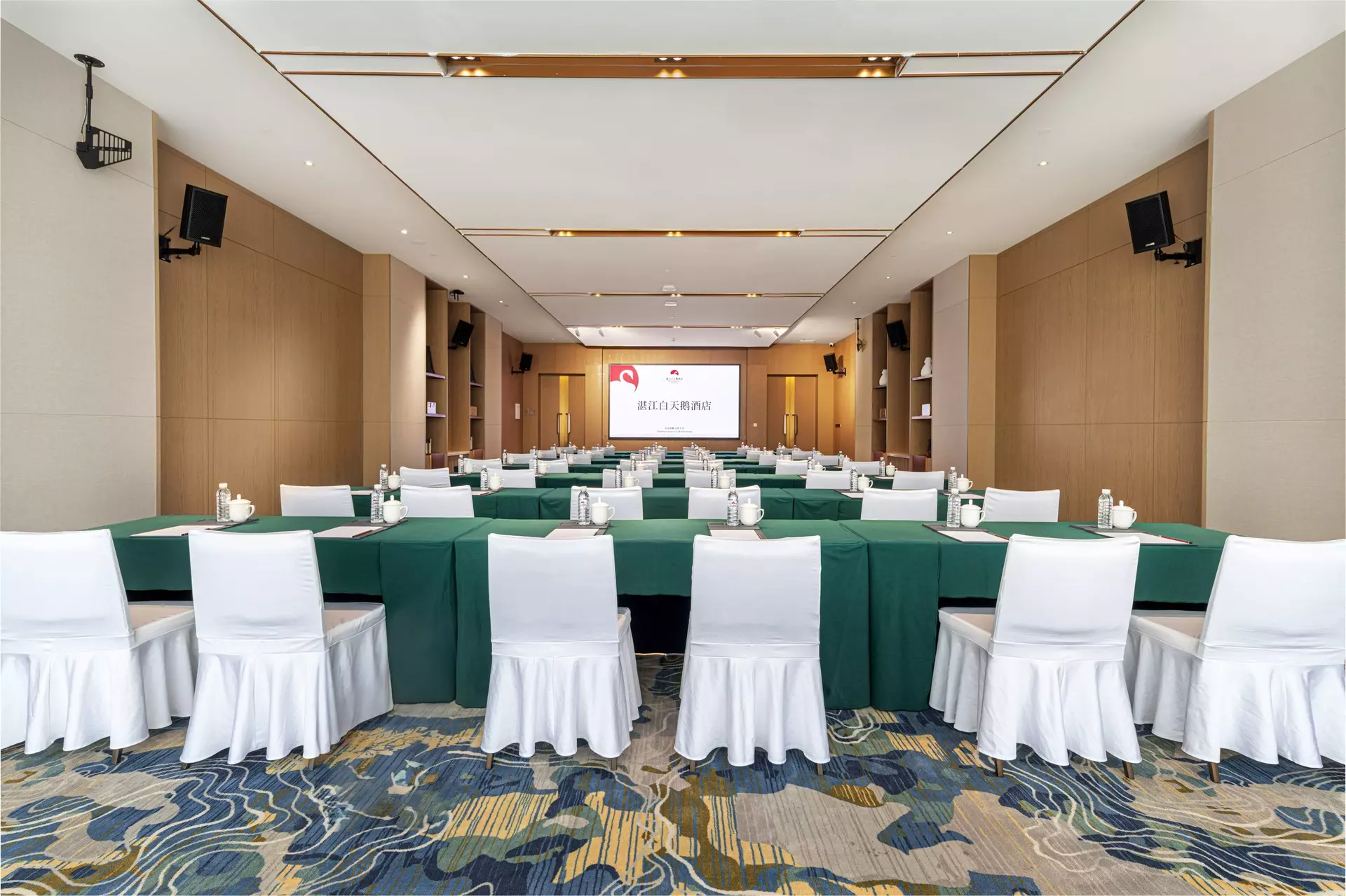 Symmetrical architectural millwork design in hotel summit room