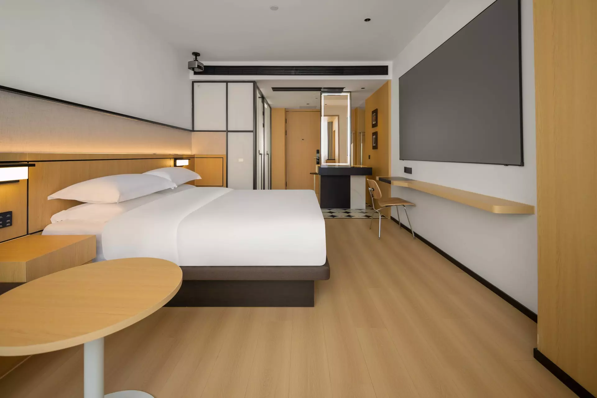 Custom integrated lounge amenities and modern interior joinery systems